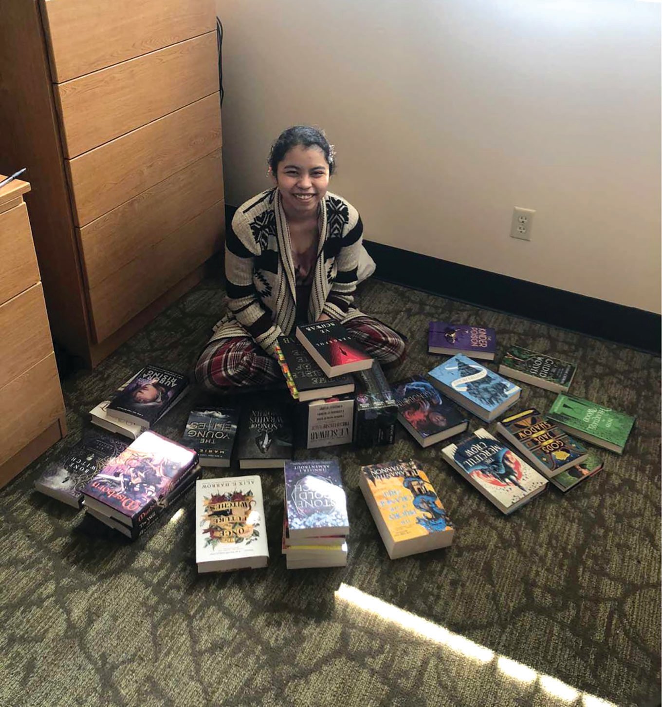 Selena Jarquin-Vanegas indulged her love of reading by purchasing more than 30 books with her scholarship money.